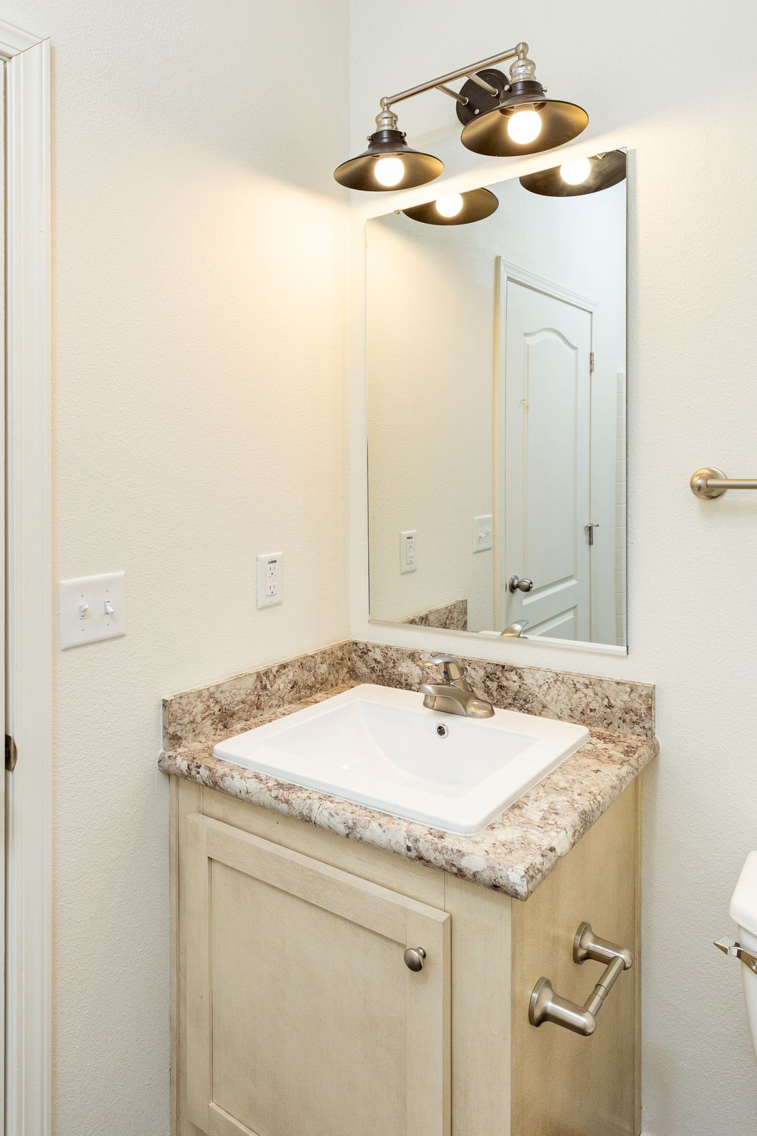 The 2017 COLUMBIA RIVER Guest Bathroom. This Manufactured Mobile Home features 3 bedrooms and 2 baths.