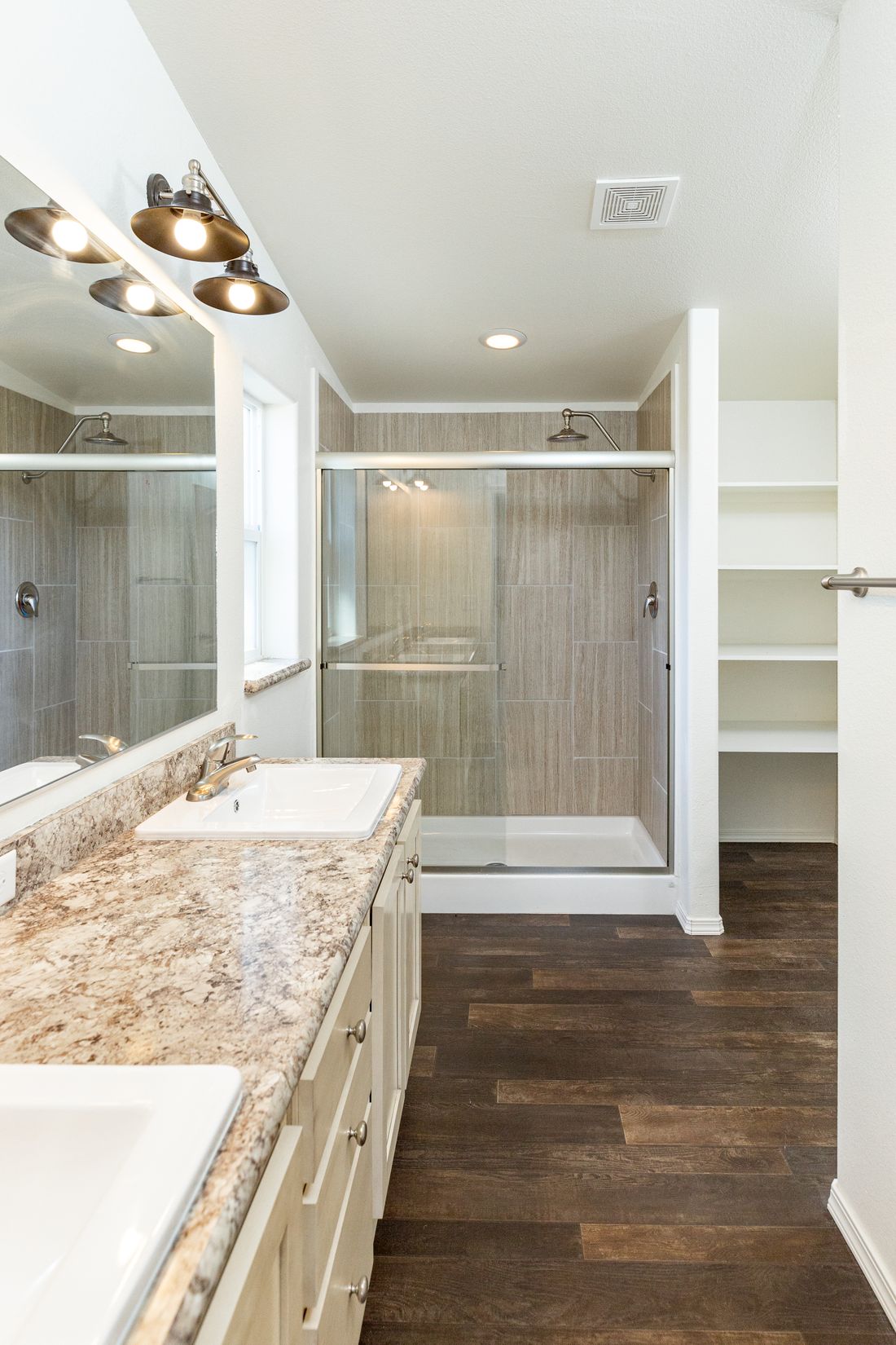 The 2017 COLUMBIA RIVER Primary Bathroom. This Manufactured Mobile Home features 3 bedrooms and 2 baths.