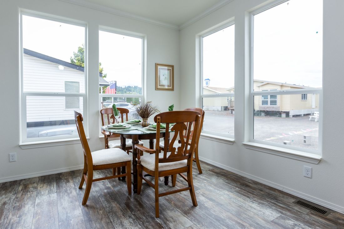 The 2848 MARLETTE SPECIAL Dining Area. This Manufactured Mobile Home features 3 bedrooms and 2 baths.