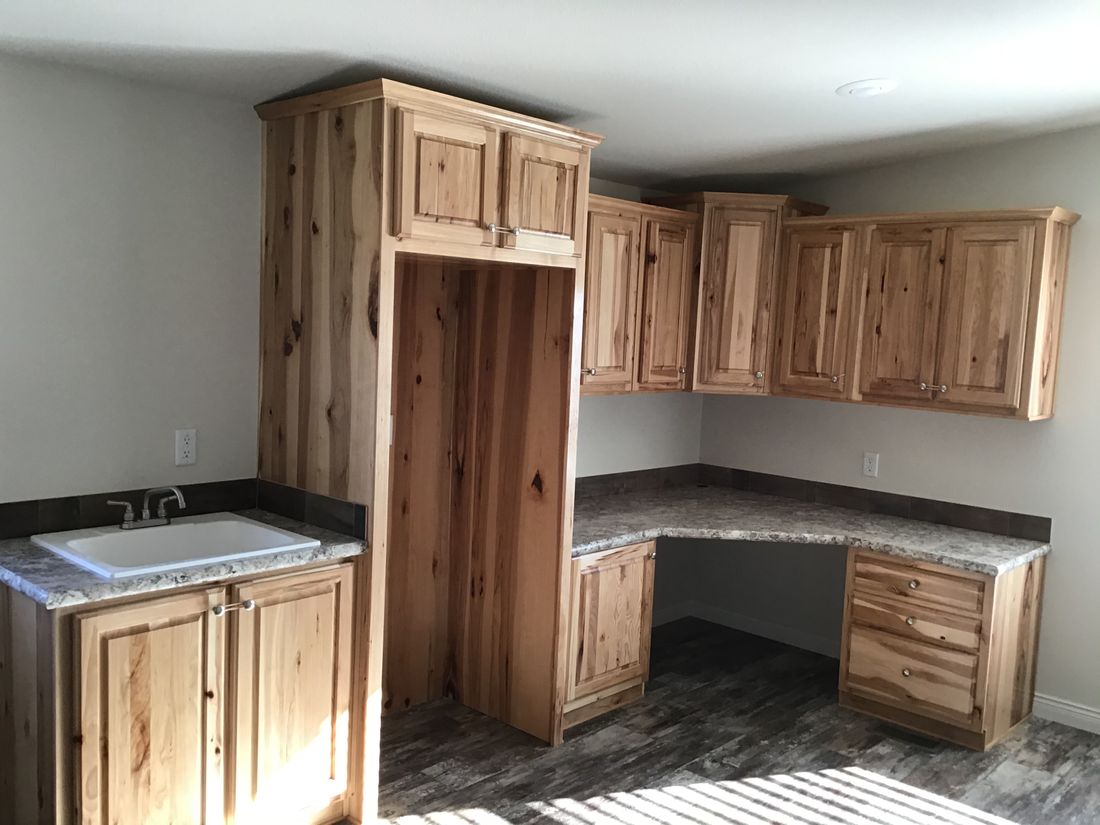 The 9596S RAINIER Utility Room. This Manufactured Mobile Home features 3 bedrooms and 2 baths.
