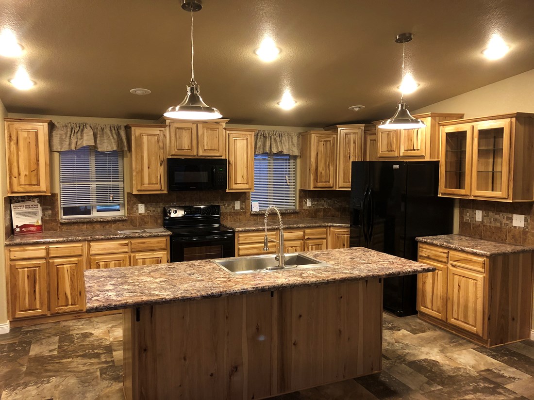 The 9588S THE SAINT HELENS Kitchen. This Manufactured Mobile Home features 3 bedrooms and 2 baths.